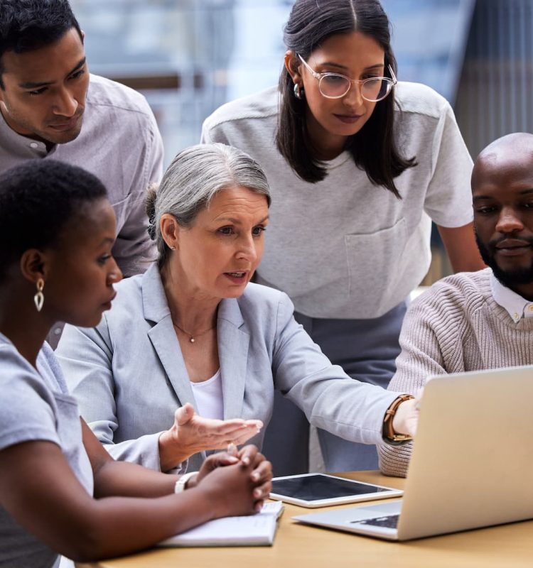 shot-of-a-group-of-professional-coworkers-using-a-2023-11-27-05-02-29-utc (1)